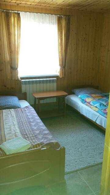 Фото номера Бюджетный двухместный номер с 2 отдельными кроватями Загородные дома Агроусадьба Aisty г. Гатовичи 2